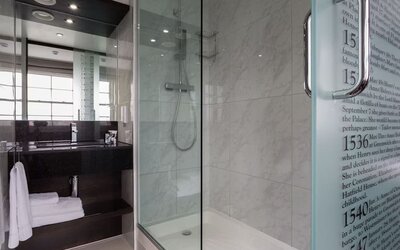 Guest bathroom with shower at DoubleTree by Hilton London Greenwich.