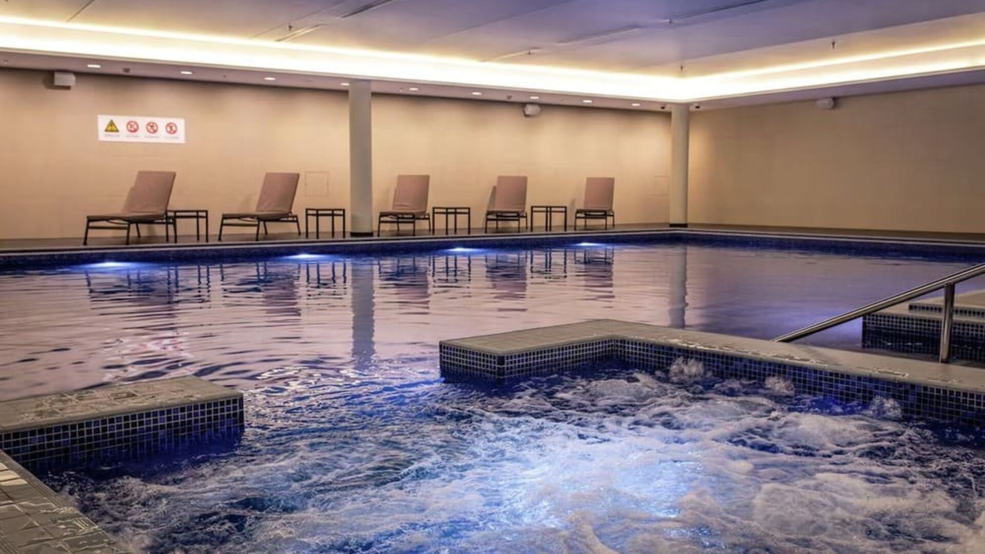 Refreshing indoor pool at Lincoln Plaza London, Curio Collection By Hilton.