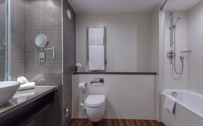 Guest bathroom with shower at DoubleTree By Hilton Stratford-upon-Avon.