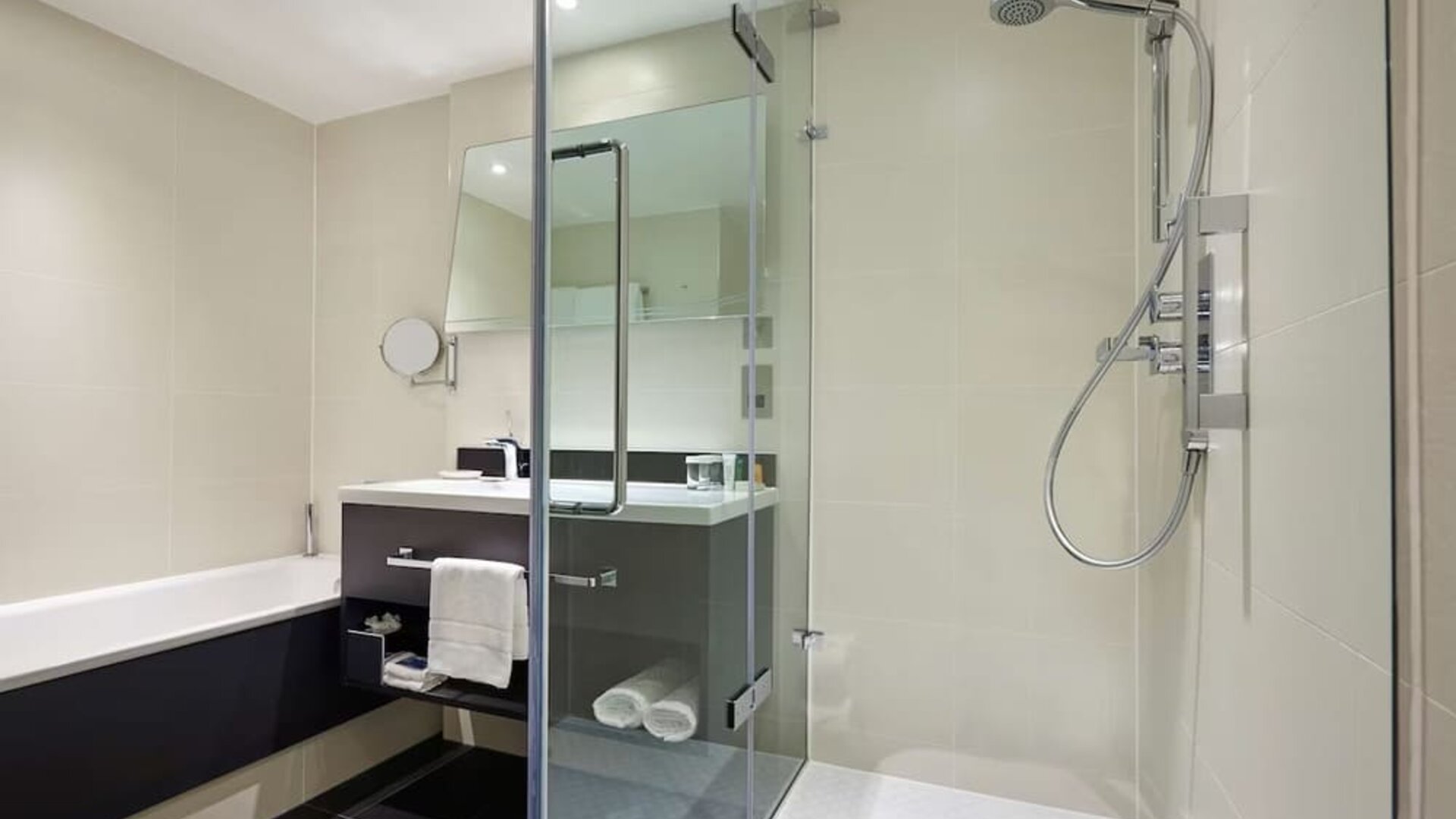 Guest bathroom with shower at Hilton London Heathrow Airport.