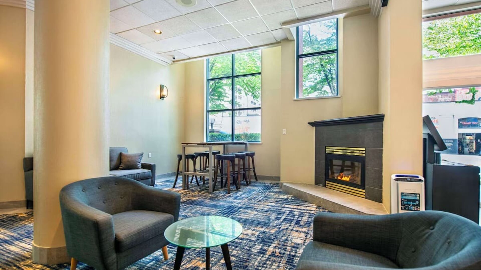 Lounge and fireplace at Grand Park Hotel & Suites Downtown Vancouver.