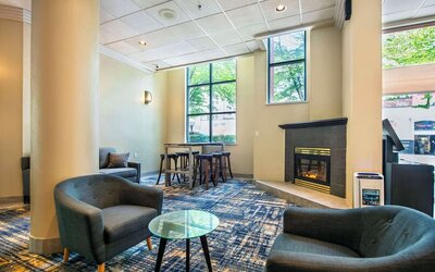 Lounge and fireplace at Grand Park Hotel & Suites Downtown Vancouver.
