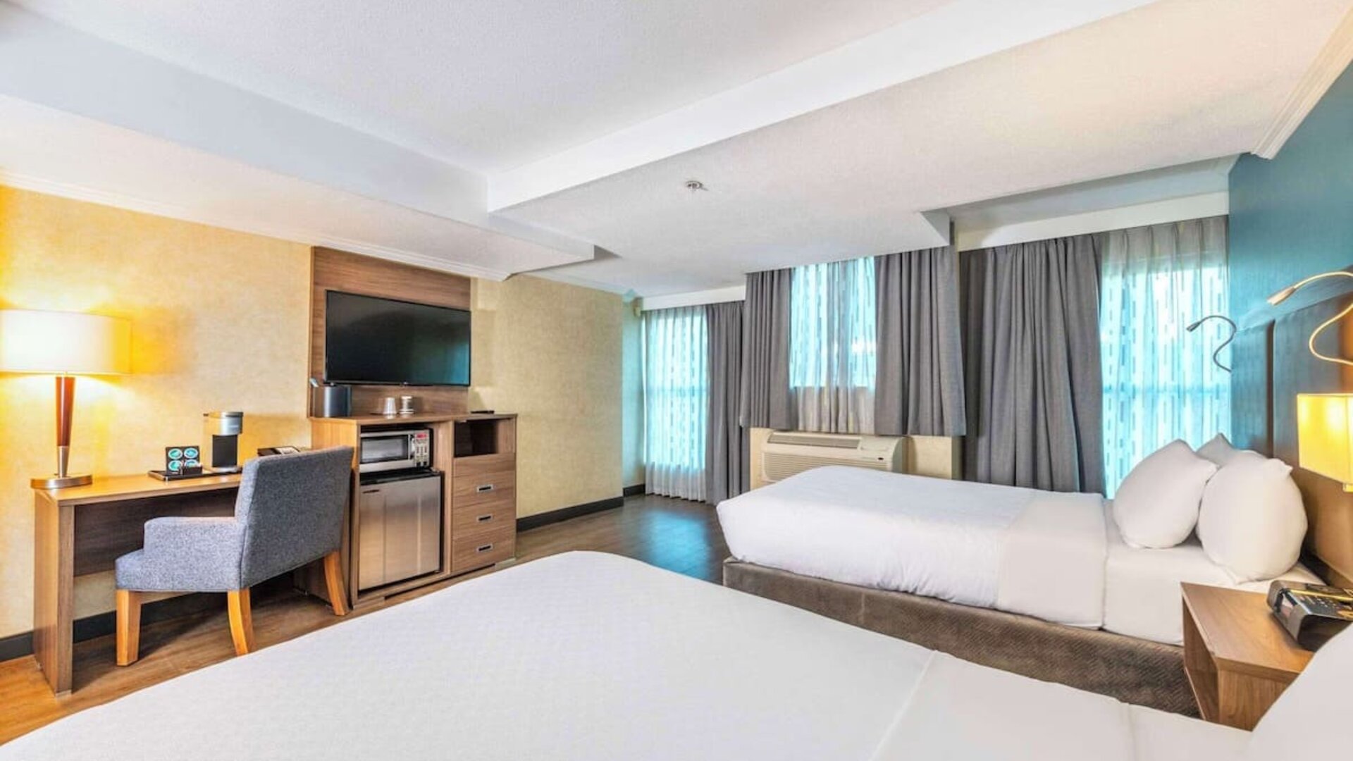 Day room with queen beds at Grand Park Hotel & Suites Downtown Vancouver.