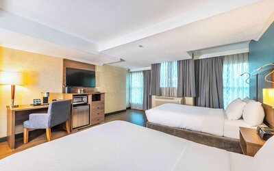 Day room with queen beds at Grand Park Hotel & Suites Downtown Vancouver.