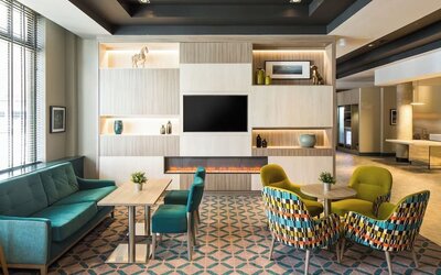 Lobby and coworking lounge at Leonardo Hotel Belfast.
