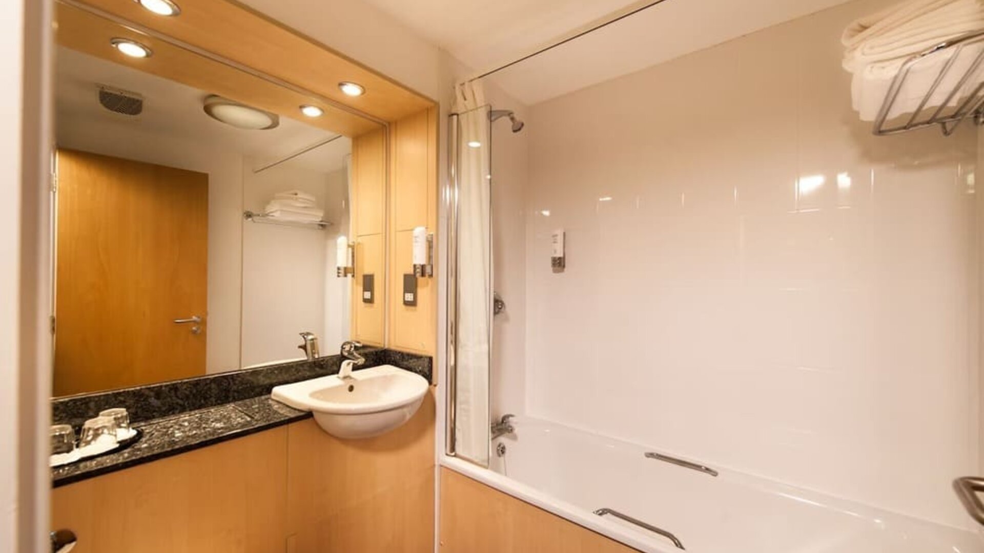 Guest bathroom with shower at Leonardo Inn Aberdeen Airport.