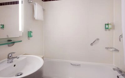 Private guest bathroom at Leonardo Hotel London Watford.