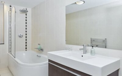 Guest bathroom with shower at Leonardo Hotel Edinburgh Murrayfield.