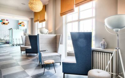 Lobby and coworking lounge at Leonardo Royal Hotel Edinburgh Haymarket. 