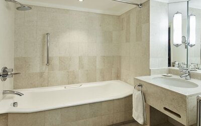 Guest bathroom with shower and at The Dilly.  