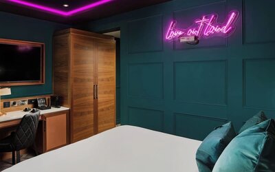 Day use room with TV and work desk at NYX Dublin Christchurch.