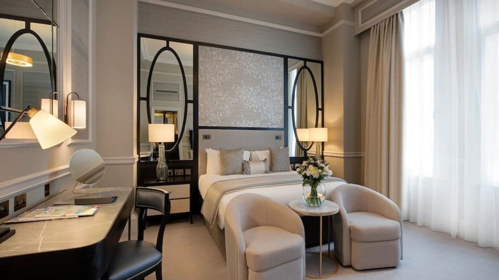 Elegant day use room with work desk and high windows at The Midland - A Leonardo Royal Hotel.