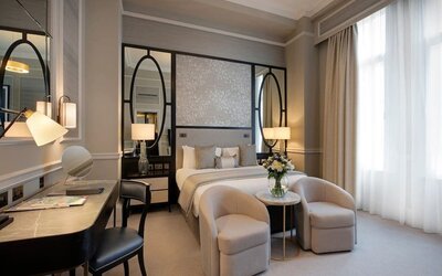 Elegant day use room with work desk and high windows at The Midland - A Leonardo Royal Hotel.