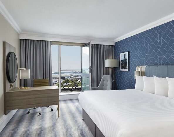 Day use room with work desk and terrace at Leonardo Hotel Southampton Grand Harbour.