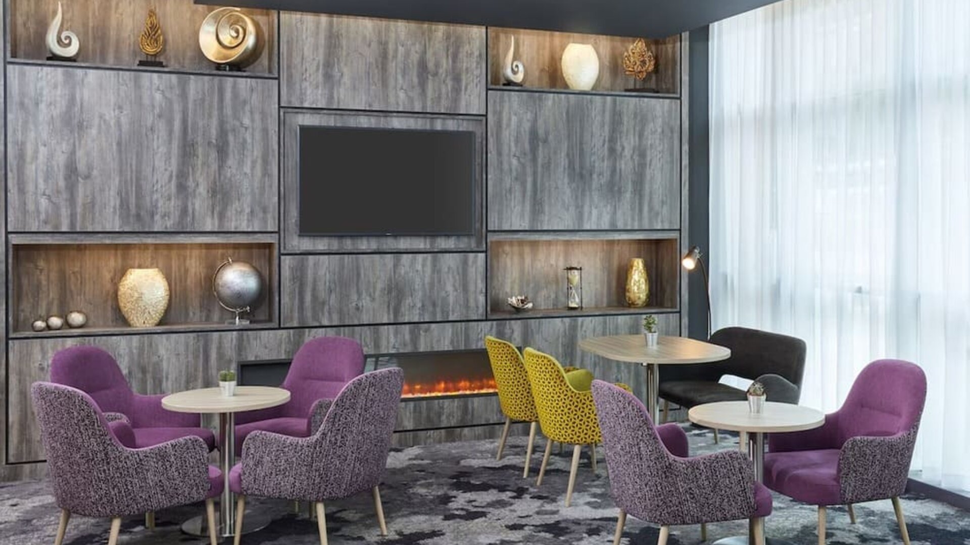 Lobby and coworking lounge at Leonardo Hotel Sheffield.