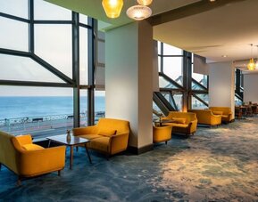 Hotel lounge at Leonardo Royal Hotel Brighton Waterfront.