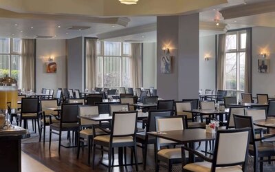 Dining area perfect for coworking at DoubleTree by Hilton Dartford Bridge.