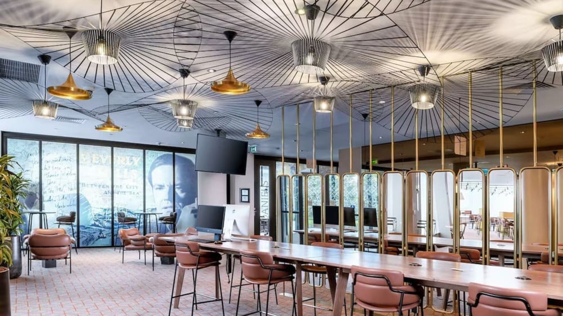 Lobby and coworking lounge at Hilton Garden Inn London Heathrow Airport.