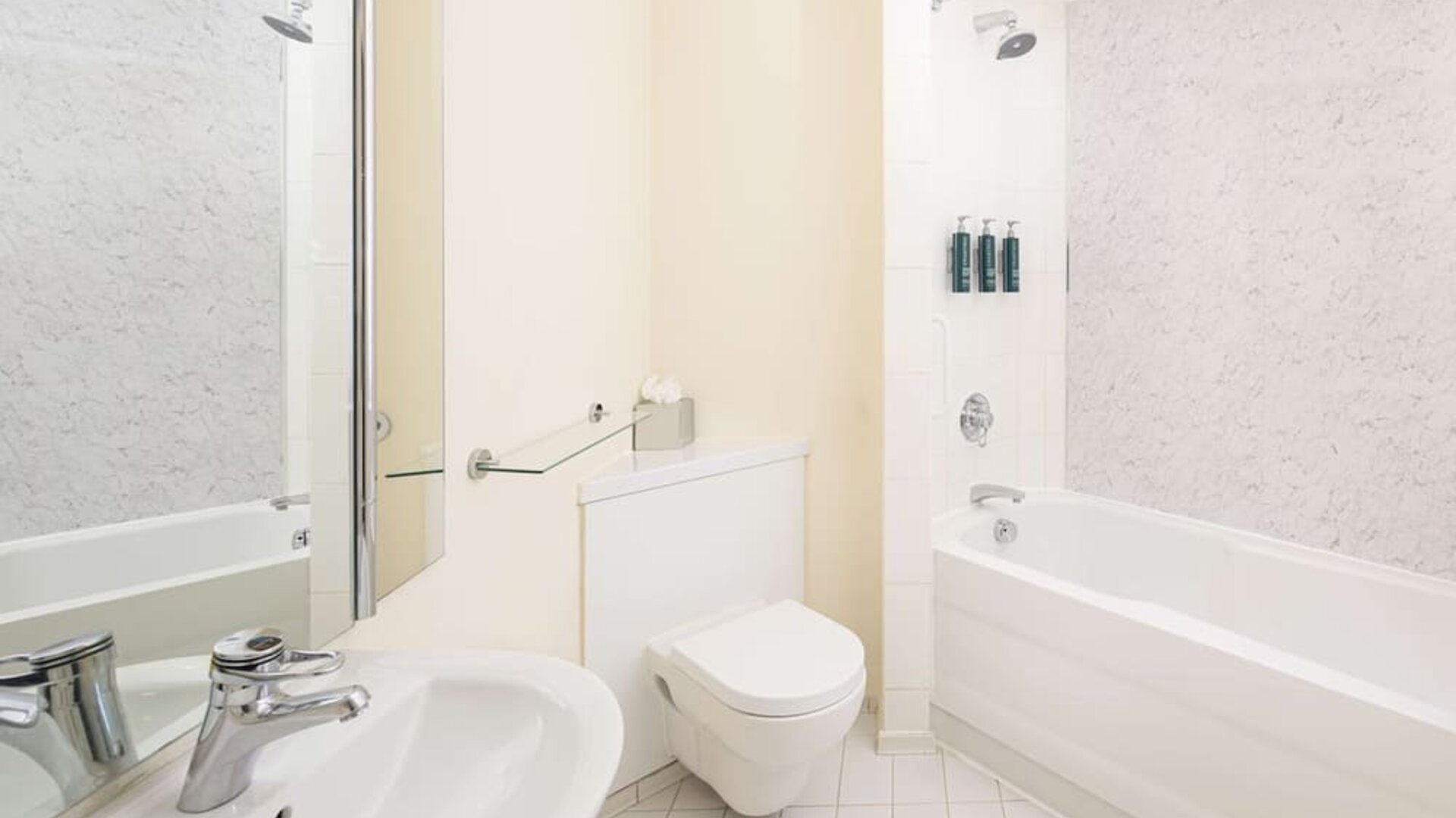 Guest bathroom with shower and tub at Hilton Northampton.