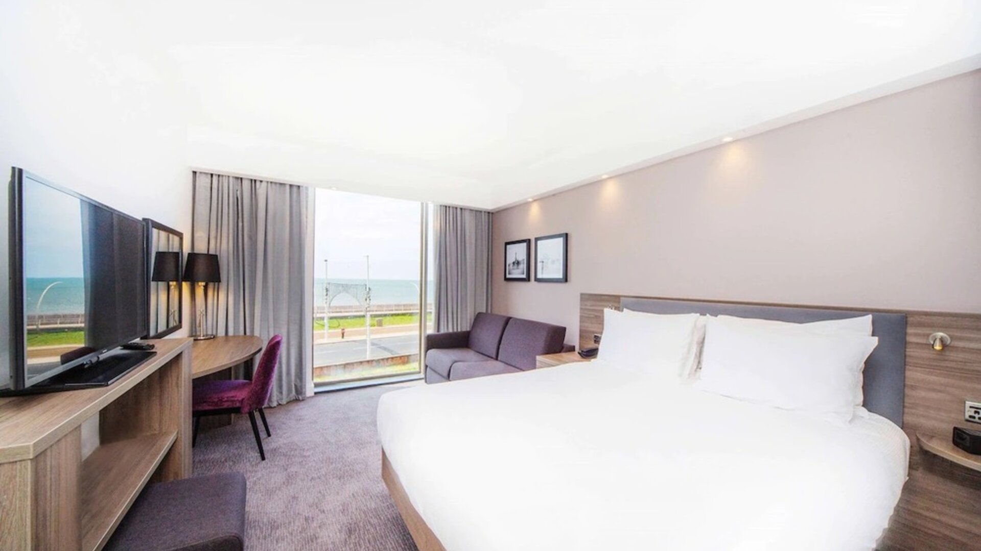 Day use room with work desk and sofa at Hampton By Hilton Blackpool.