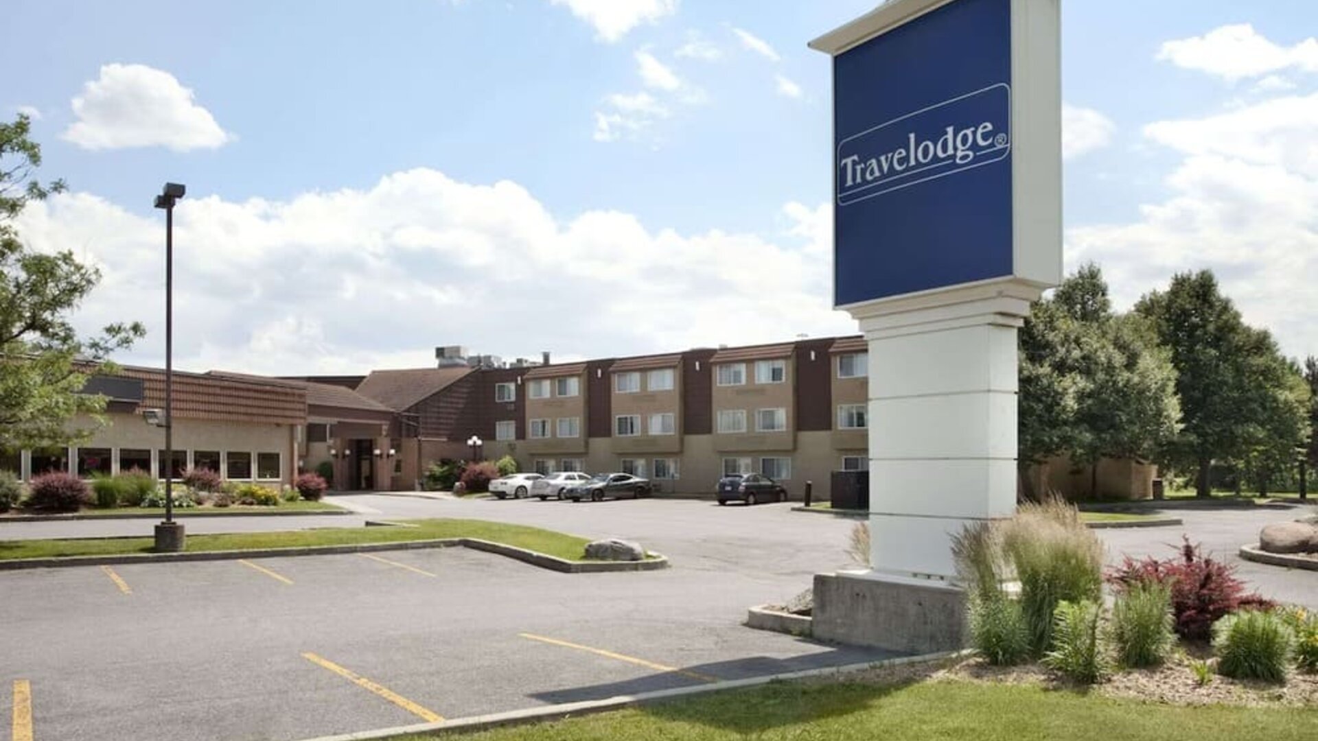 Hotel parking lot at Travelodge Ottawa East.