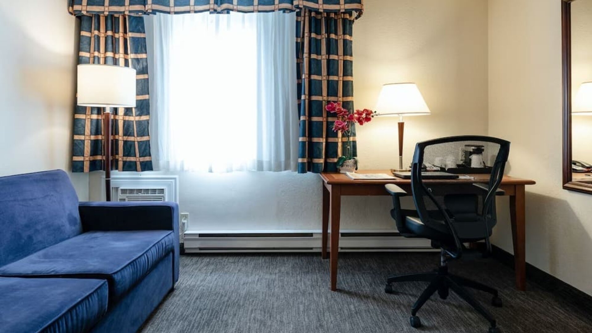 Work station and lounge in day use room at Travelodge Ottawa East.