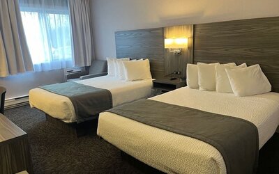 Double bed day use room with workstation at Travelodge Ottawa East.