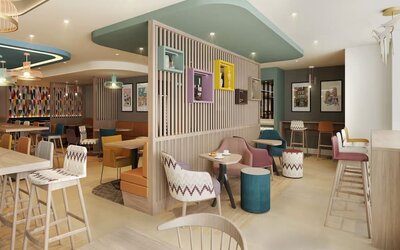 Lobby and coworking lounge at Hampton By Hilton London City.