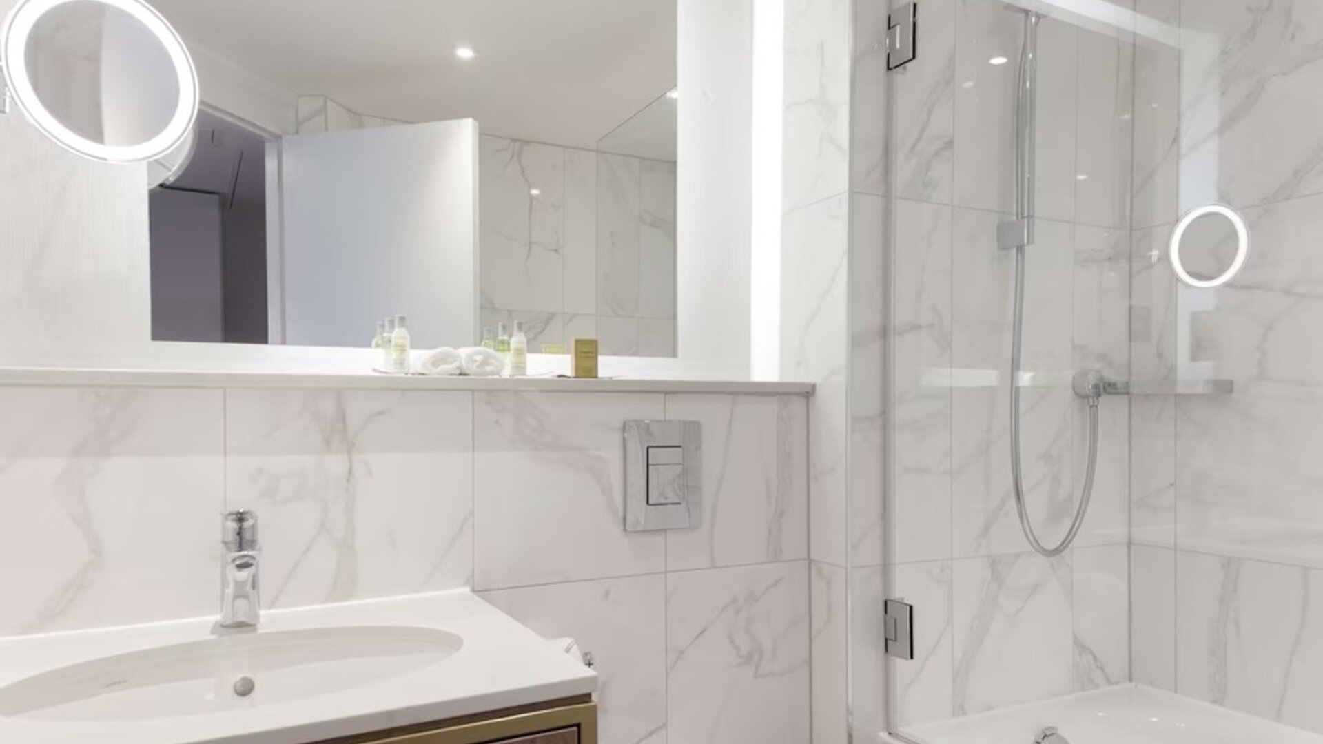 Guest bathroom with shower and tub at DoubleTree By Hilton Stoke On Trent.