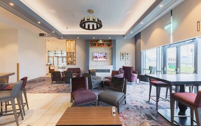 Lobby and coworking lounge at Hilton Garden Inn Birmingham Airport.