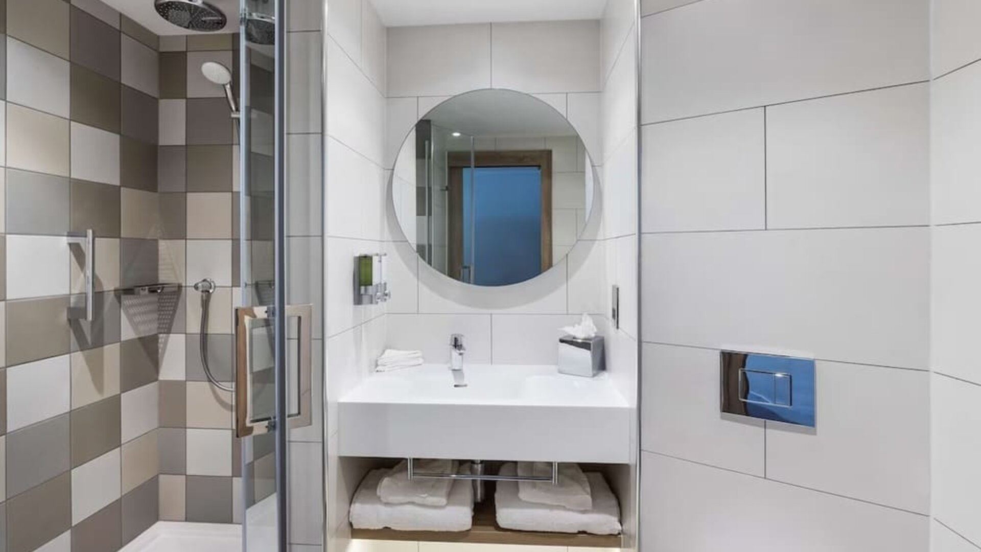 Guest bathroom with shower at Hampton By Hilton Torquay.