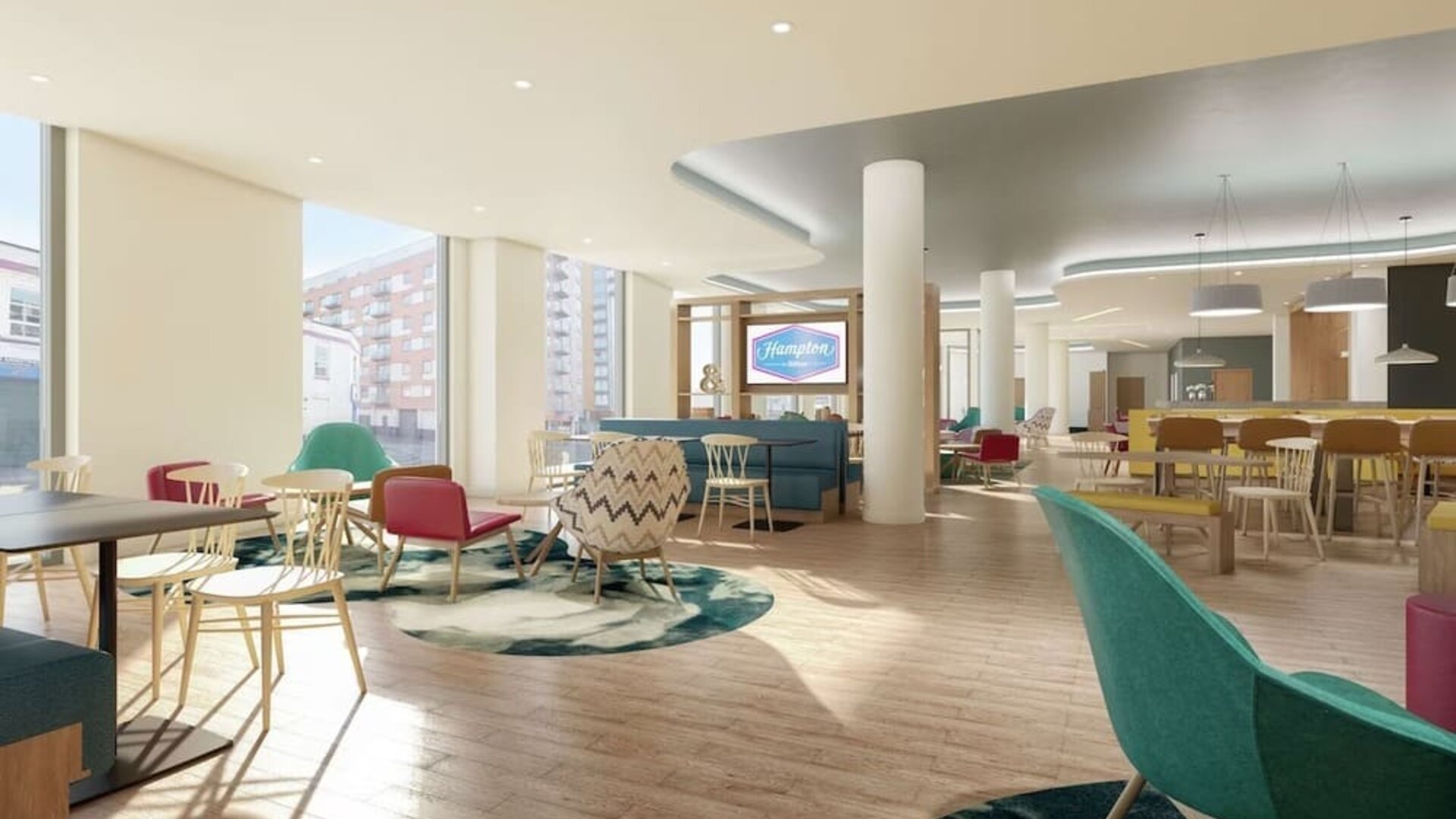 Comfortable and stylish lobby workspace at the Hampton by Hilton Manchester Northern Quarter.