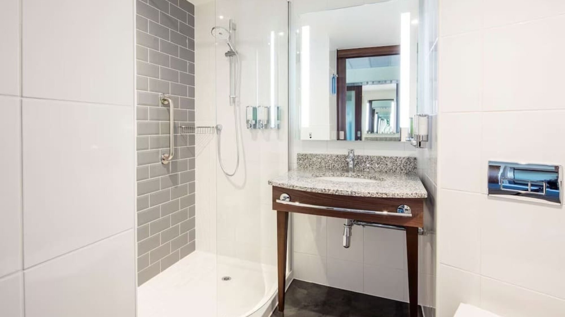 Guest bathroom with shower at Hampton By Hilton Humberside Airport.