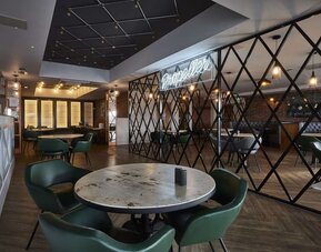 Dining area perfect for coworking at Hampton By Hilton Humberside Airport.