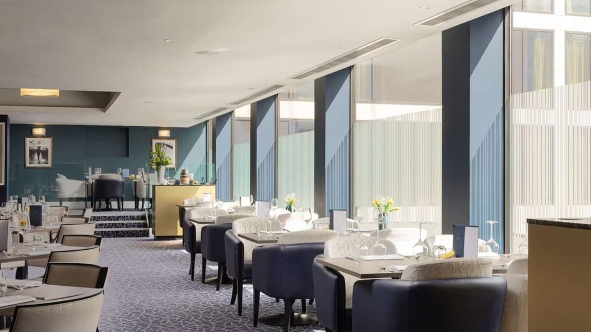 Spacious and elegant restaurant area perfect as workspace at the Hilton London Gatwick Airport.