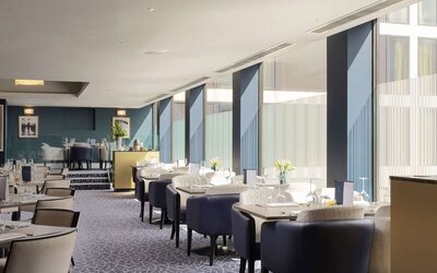 Spacious and elegant restaurant area perfect as workspace at the Hilton London Gatwick Airport.