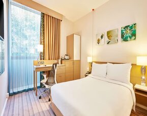 Bright day use room with work desk and TV at the Hilton Garden Inn Birmingham Brindleyplace.