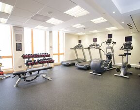 Fitness center with treadmills, machines and equipment at the Hilton Garden Inn Birmingham Brindleyplace.