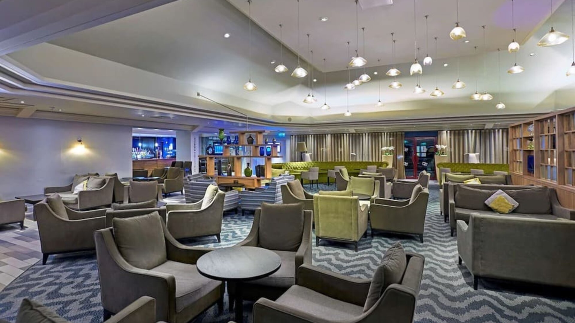 Elegant dining area with tables and chairs at the DoubleTree by Hilton Bristol North.