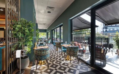 Hotel restaurant with lake view at the Hilton Birmingham Metropole.