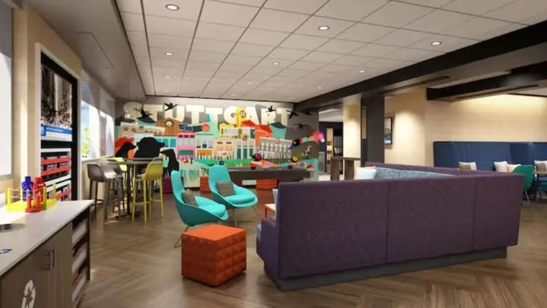 Vibrant hotel lobby with comfortable seating, games, and social gathering spaces at Tru By Hilton Lithia Springs.