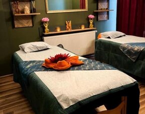 Twin spa treatment room designed for relaxing wellness experiences at Hotel Seven.