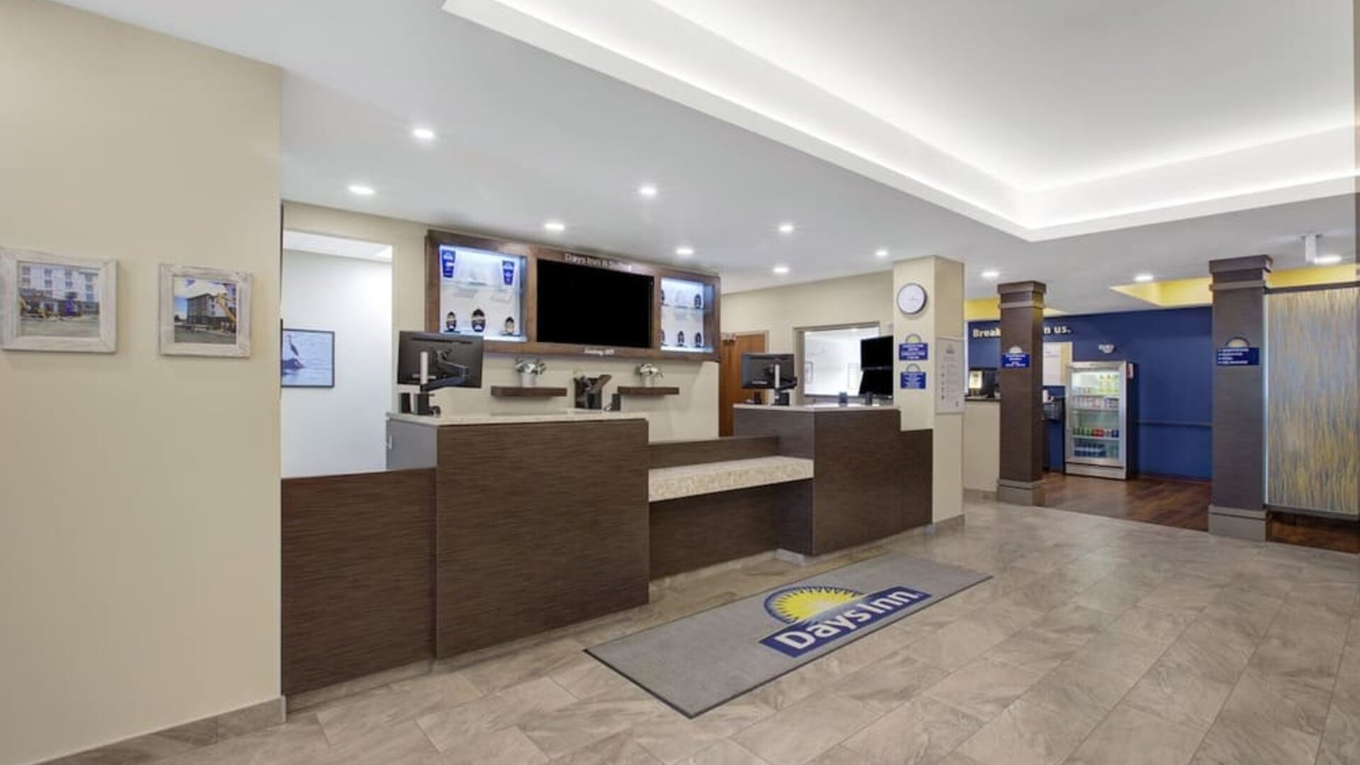 Modern reception area with front desk and welcoming lobby at Days Inn & Suites By Wyndham Lindsay.