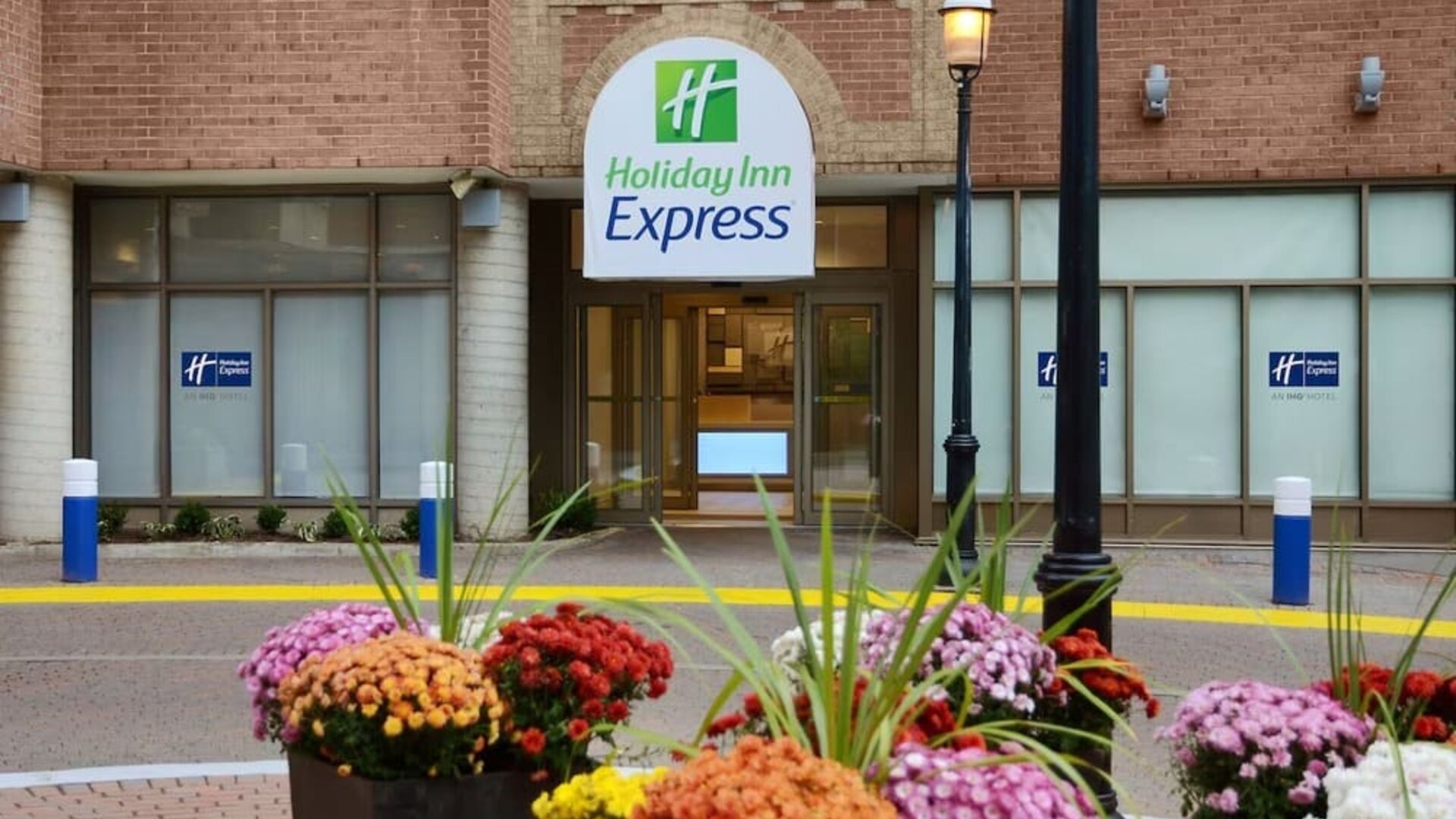 Main entrance to Holiday Inn Express Toronto Downtown with convenient downtown access.