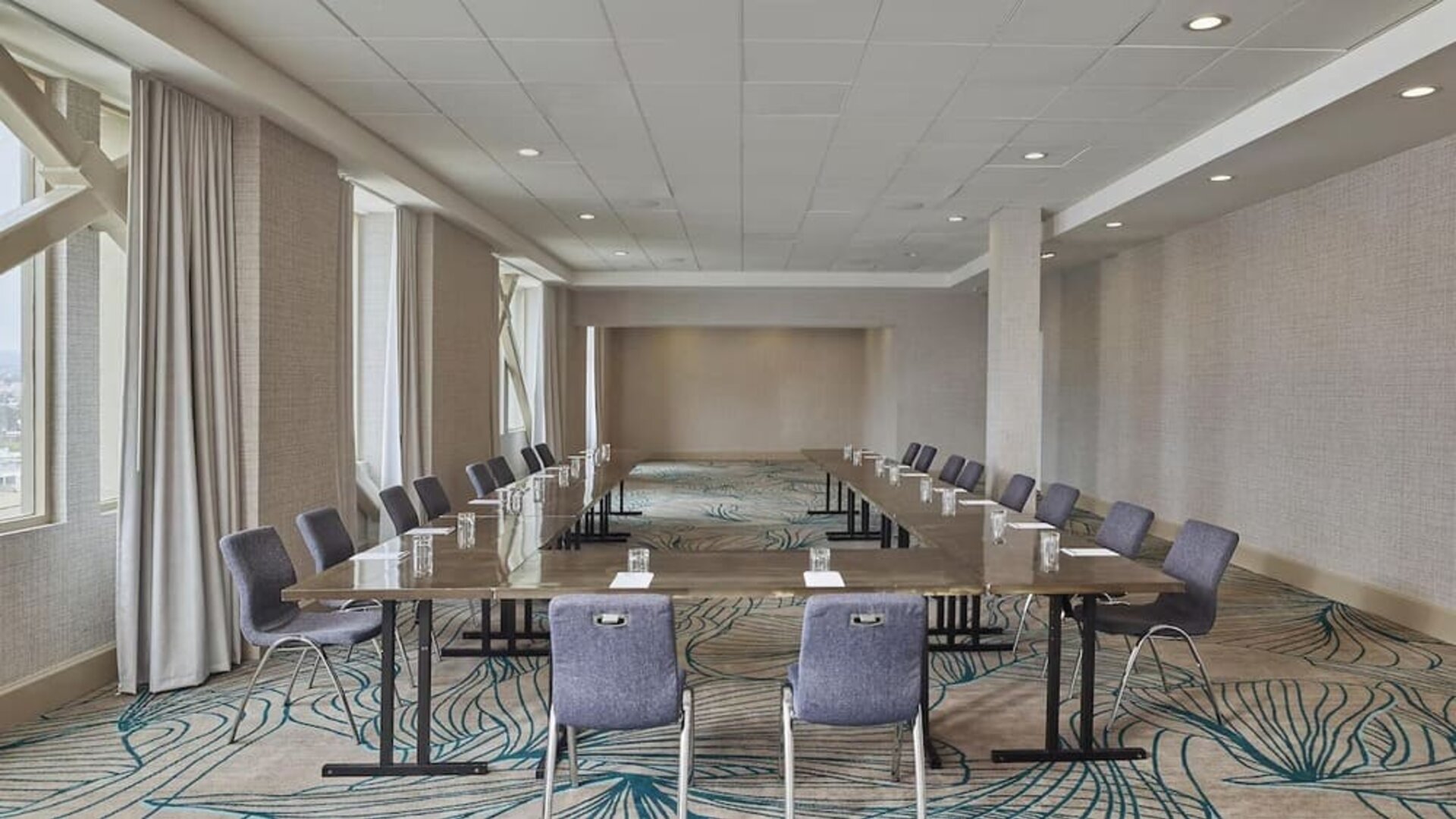 Flexible meeting facility with natural light and customizable layouts for corporate events, training sessions, and private gatherings at Hyatt Centric Delfina Santa Monica.