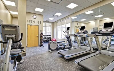 Well-equipped fitness center with treadmills, elliptical machines, and cardio equipment at Fairfield Inn & Suites Guelph.