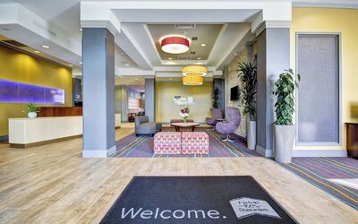 Modern hotel lobby featuring stylish seating, contemporary décor, and a welcoming reception area at Fairfield Inn & Suites Guelph.
