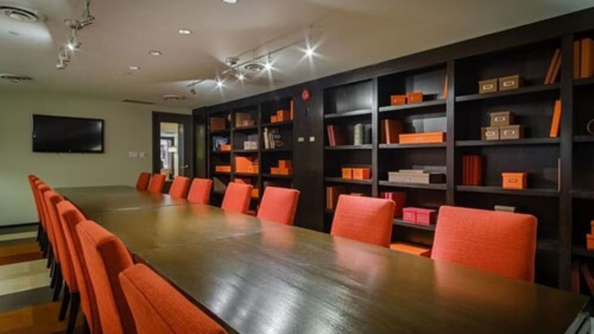 Executive boardroom with professional seating and a sophisticated setting for business meetings at ARC The Hotel Ottawa.