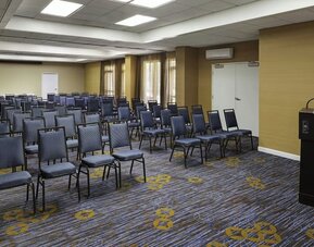 Versatile event space arranged for presentations, seminars, and corporate meetings at Courtyard Riverside UCR/Moreno Valley Area.