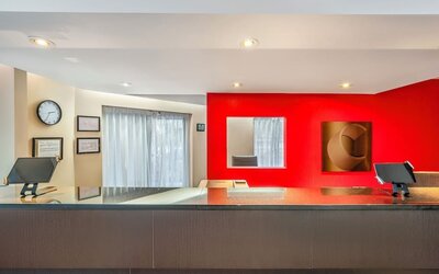 Front desk reception area providing friendly service and convenient guest check-in at Comfort Inn Sherbrooke.